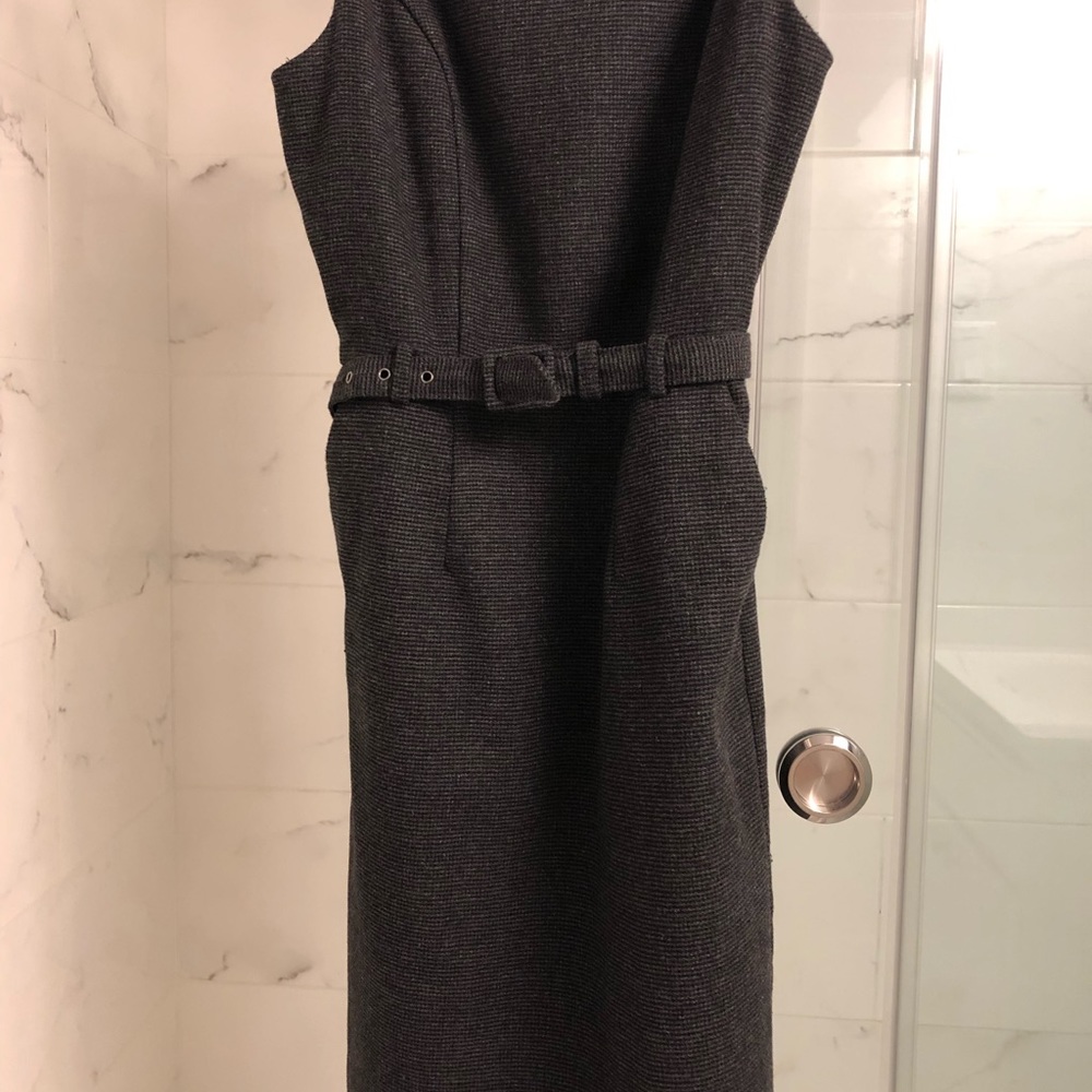 Grey 40% wool fitted dress with belt.
